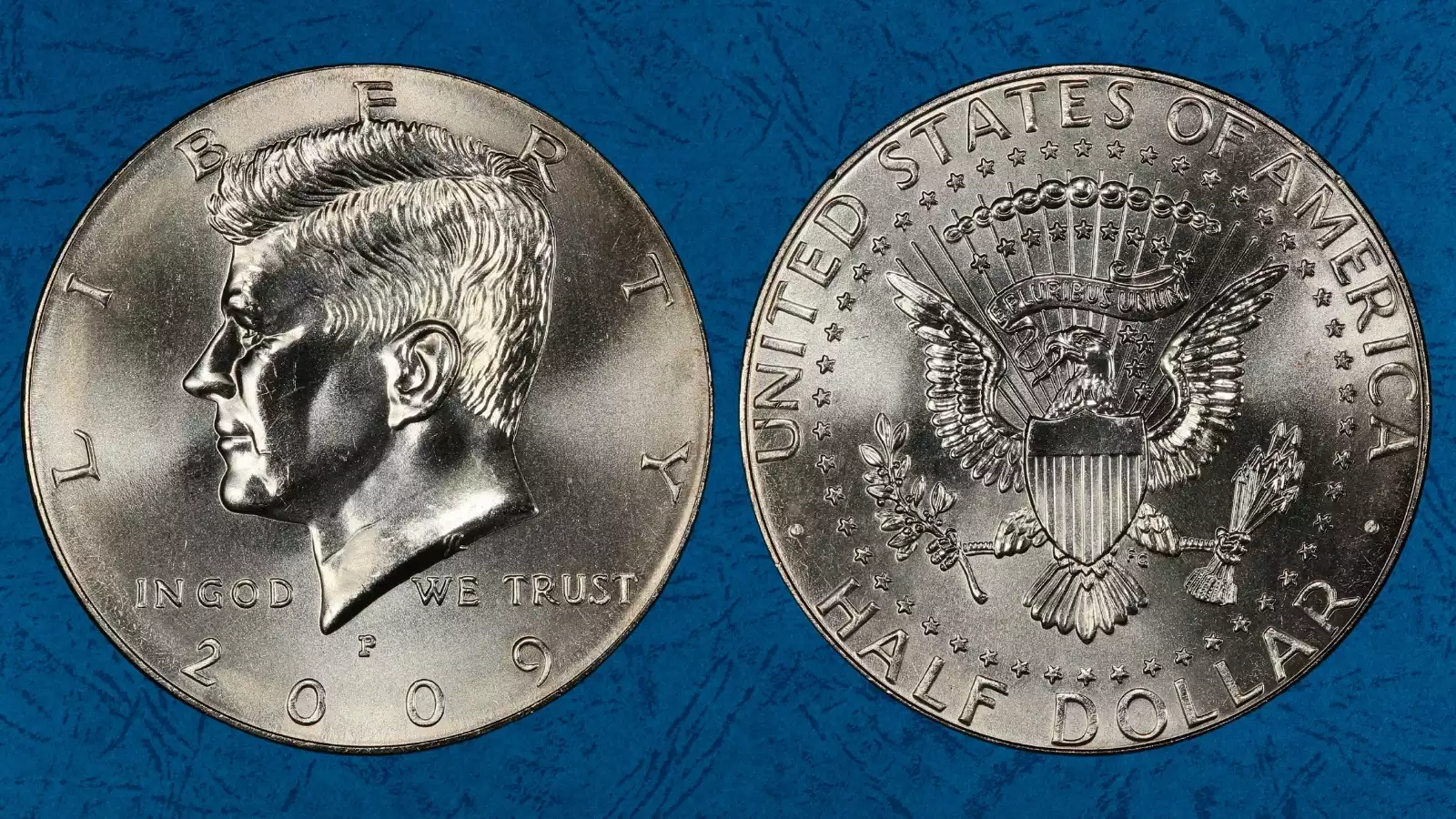 Grading strip showing 2009 Kennedy half dollar condition tiers from MS60 bag-marked to MS68 gem quality